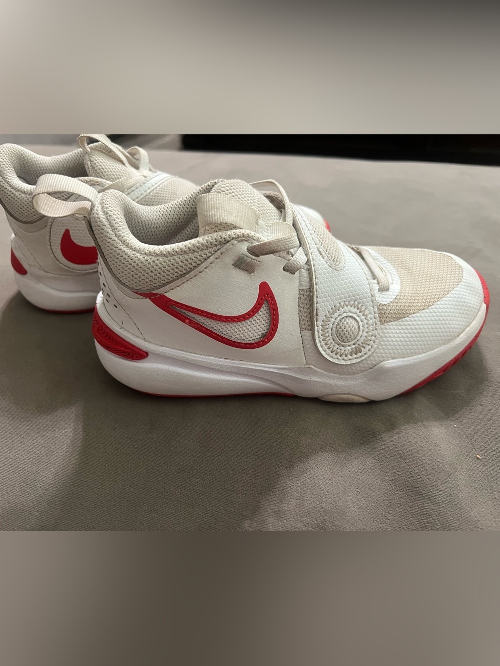 Nike Kids White Sneakers with Red Swoosh Accents
